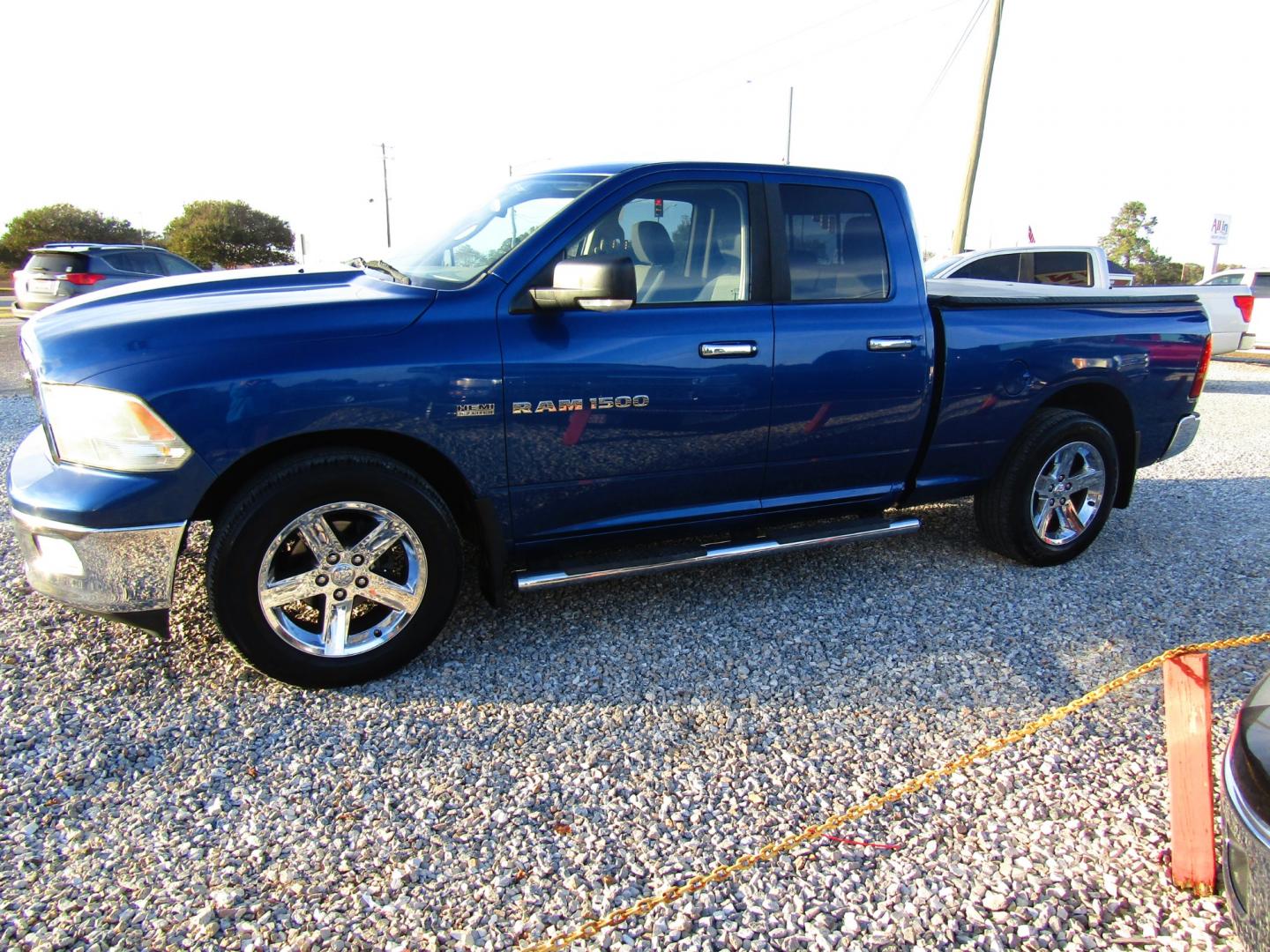 2011 Blue Dodge Ram 1500 SLT Quad Cab 2WD (1D7RB1GT3BS) with an 5.7L V8 OHV 16V engine, Automatic transmission, located at 15016 S Hwy 231, Midland City, AL, 36350, (334) 983-3001, 31.306210, -85.495277 - Photo#2